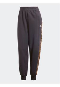 Adidas - adidas Spodnie dresowe Essentials 3-Stripes IS2155 Czarny Loose Fit. Kolor: czarny. Materiał: bawełna