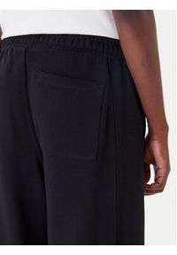 Calvin Klein Jeans Spodnie dresowe LV047C249G Czarny Regular Fit. Kolor: czarny. Materiał: bawełna #4