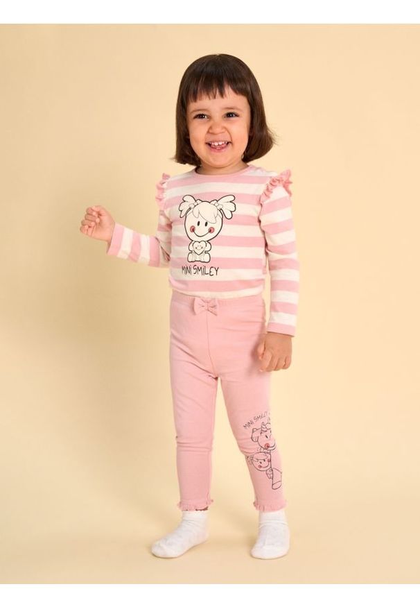 Sinsay - Spodnie z falbaną i kokardką Mini Smiley - różowy. Kolor: różowy