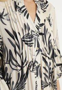 Born2be - Ciemnoszara Sukienka z Wiskozy o Rozkloszowanym Kroju z Falbanami w Roślinny Wzór Ridiara. Okazja: na co dzień, na imprezę. Typ kołnierza: dekolt w serek. Kolor: szary. Materiał: wiskoza. Typ sukienki: rozkloszowane. Styl: casual, elegancki, klasyczny #5