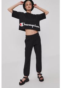 Champion Spodnie damskie kolor czarny gładkie. Kolor: czarny. Materiał: dzianina. Wzór: gładki