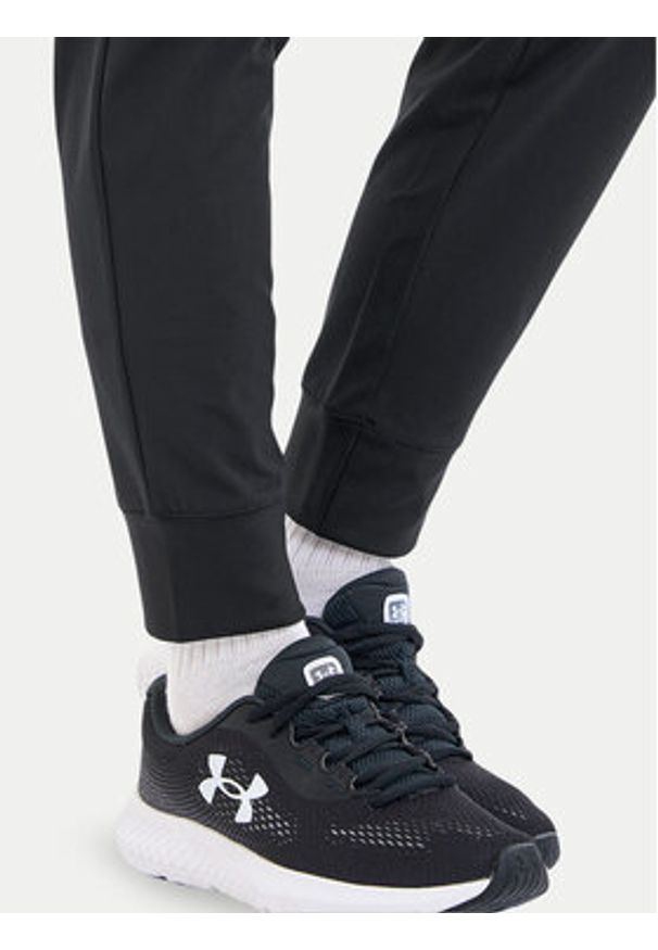 Under Armour Spodnie dresowe Armoursport High Rise Wvn Pnt 1382727-001 Czarny Loose Fit. Kolor: czarny. Materiał: syntetyk