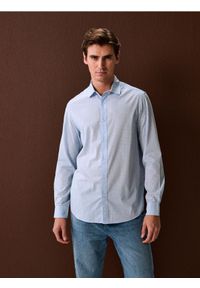 Sinsay - Koszula z długim rękawem we wzory - błękitny. Kolor: niebieski. Długość rękawa: długi rękaw. Długość: długie #1