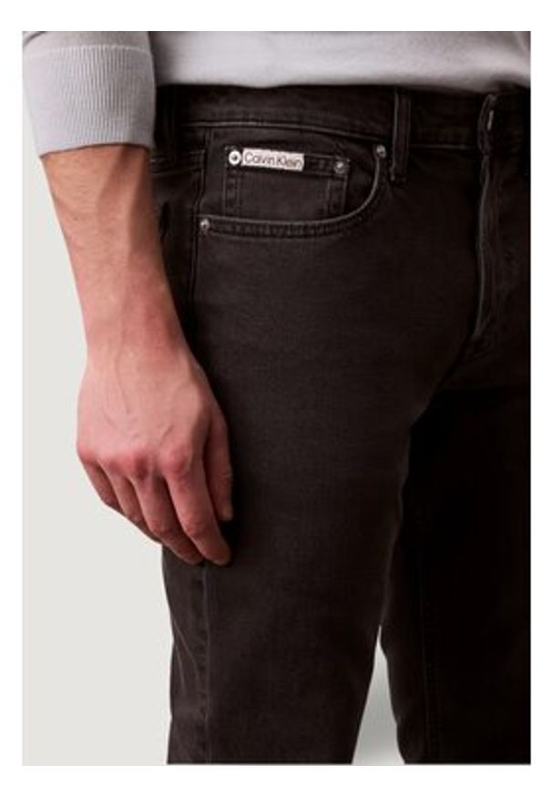 Calvin Klein Jeans Jeansy SLIM CK ESSENTIAL BL Czarny Slim Fit. Kolor: czarny