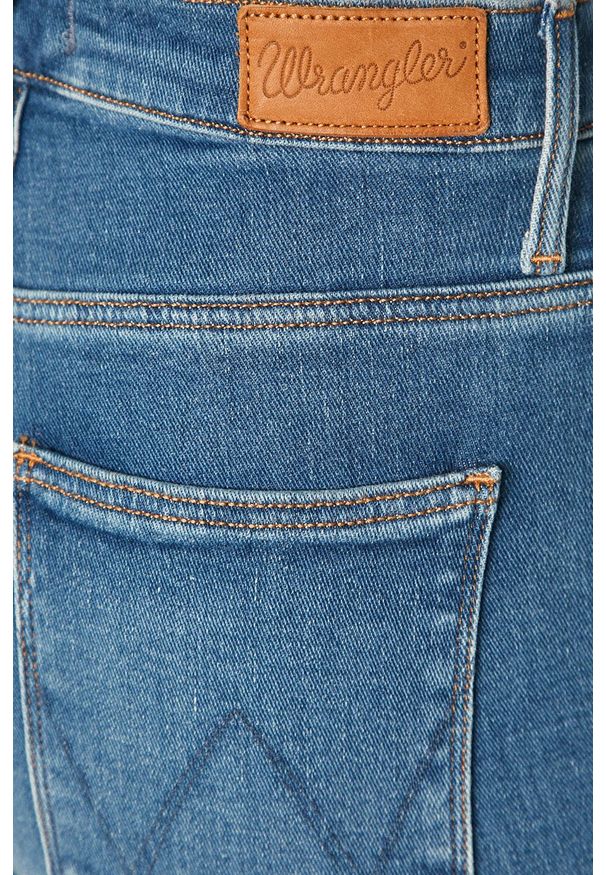 Wrangler - Jeansy. Kolor: niebieski. Wzór: aplikacja