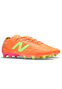 Korki męskie New Balance TEKELA ELITE FG V5 ST1FLTE5 – pomarańczowe. Kolor: pomarańczowy. Materiał: włókno. Szerokość cholewki: normalna #5