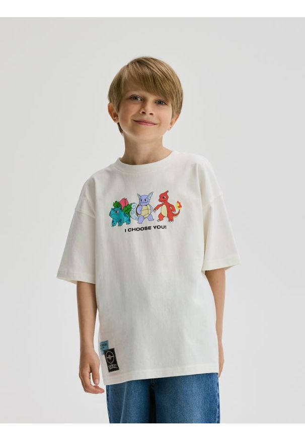 Reserved - T-shirt Pokémon - złamana biel. Materiał: dzianina, bawełna