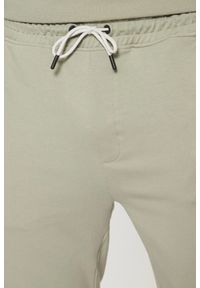 Guess - GUESS Zielone męskie spodnie dresowe z lampasami New Arlo, Rozmiar XL. Kolor: zielony. Materiał: dresówka #5