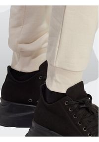 Adidas - adidas Spodnie dresowe adicolor Essentials IA6477 Beżowy Slim Fit. Kolor: beżowy. Materiał: bawełna #3