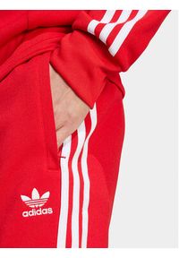 Adidas - adidas Spodnie dresowe adicolor Classics SST IM4543 Czerwony Slim Fit. Kolor: czerwony. Materiał: bawełna, syntetyk #3