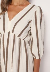 Born2be - Beżowa Taliowana Sukienka z Bawełny z Motywem Pasków Rivettes. Okazja: do pracy, na co dzień. Typ kołnierza: dekolt w kształcie V. Kolor: beżowy. Materiał: bawełna. Wzór: aplikacja. Typ sukienki: proste. Styl: klasyczny, casual, elegancki #4