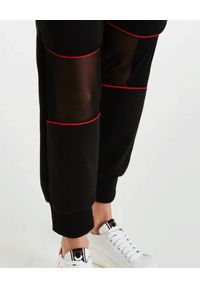 DSG - Czarne spodnie Gym. Kolor: czarny. Materiał: bawełna, dresówka, materiał. Wzór: aplikacja #3