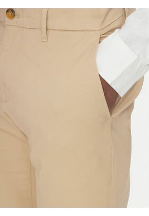 Michael Kors Chinosy CS4301KDR2 Beżowy Slim Fit. Kolor: beżowy. Materiał: bawełna