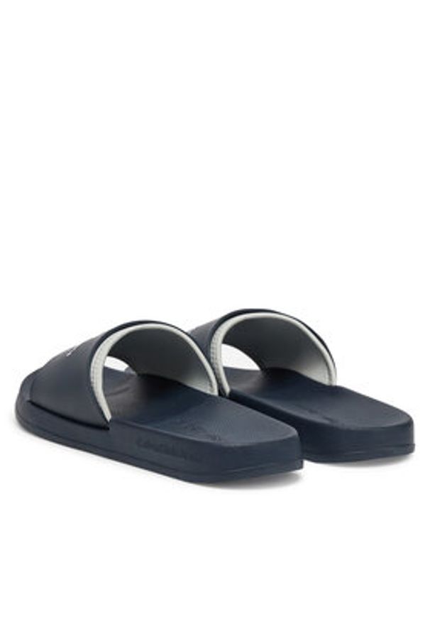 Calvin Klein Jeans Klapki Slide Rubber Neoprene Monologo YM0YM00361 Granatowy. Kolor: niebieski
