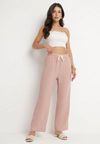 Born2be - Różowe Spodnie o Szerokim Kroju z Gumką i Wiązaniem w Talii Mirastra. Okazja: na co dzień, na spacer. Kolor: różowy. Styl: sportowy, casual, elegancki, klasyczny