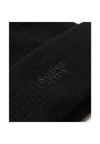 Dziecięca czapka z dzianiny Superdry Soft Rib. Kolor: czarny. Materiał: dzianina