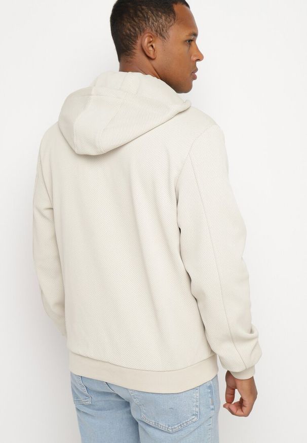 Born2be - Ciemnobeżowa Kurtka Bomberka z Kapturem Zakończona Ściągaczami i Troczkami Evianes. Typ kołnierza: kaptur. Kolor: beżowy. Materiał: jeans. Sezon: wiosna, jesień. Styl: elegancki, klasyczny