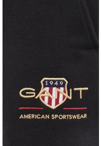 GANT - Gant spodnie dresowe 2049005. męskie kolor czarny z aplikacją. Kolor: czarny. Materiał: dresówka. Wzór: aplikacja #4