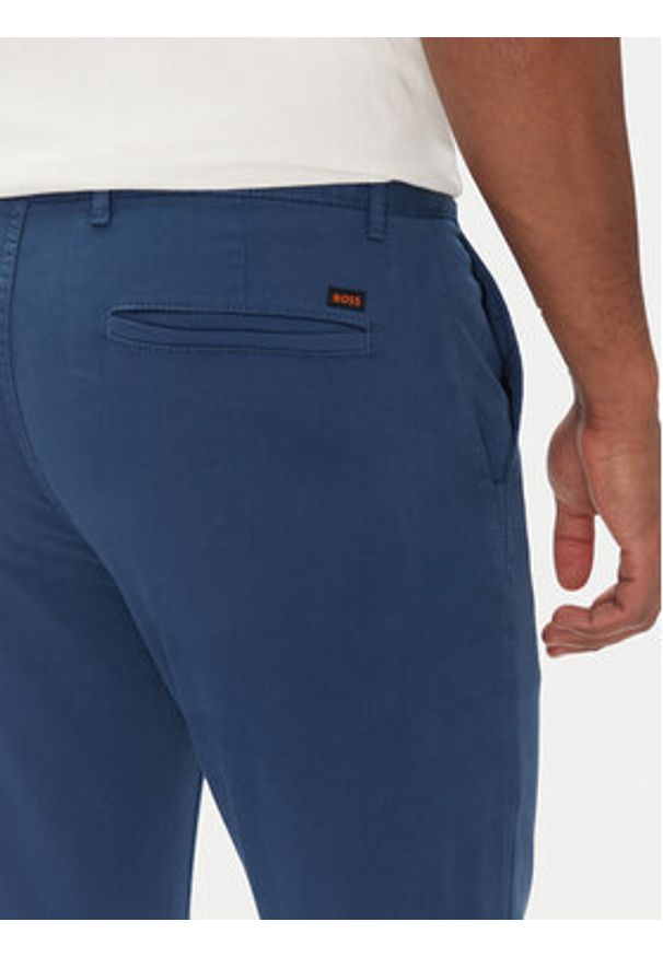 BOSS Chinosy 50510933 Niebieski Slim Fit. Kolor: niebieski. Materiał: bawełna
