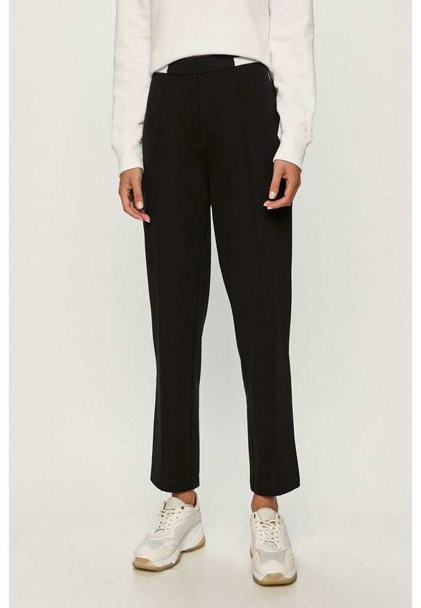 Calvin Klein Jeans - Spodnie. Okazja: na co dzień. Kolor: czarny. Materiał: materiał, wiskoza, dzianina, poliamid, elastan, poliester. Wzór: gładki. Styl: casual