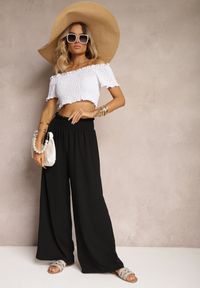 Renee - Czarne Spodnie High Waist z Szerokimi Nogawkami i Gumką w Pasie Risabessa. Okazja: na co dzień. Stan: podwyższony. Kolor: czarny. Styl: elegancki, casual