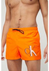 Calvin Klein szorty kąpielowe kolor pomarańczowy. Kolor: pomarańczowy. Materiał: tkanina, poliester, materiał. Wzór: nadruk
