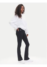 Under Armour Legginsy Motion 1379176 Czarny Slim Fit. Kolor: czarny. Materiał: syntetyk