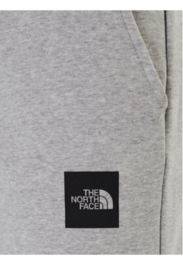 The North Face Spodnie dresowe Fine NF0A8C1K Szary Tapered Fit. Kolor: szary. Materiał: bawełna