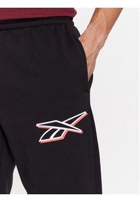 Reebok Spodnie dresowe Identity IN1684 Czarny Regular Fit. Kolor: czarny. Materiał: bawełna
