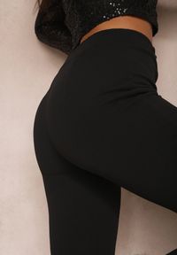 Renee - Czarne Spodnie Nicoli. Kolor: czarny. Materiał: tkanina. Długość: długie. Wzór: jednolity, gładki