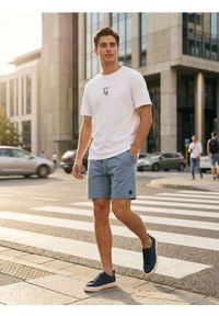 Sinsay - Szorty dresowe z wiązaniem - niebieski. Kolor: niebieski. Materiał: dresówka #1