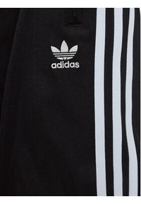 Adidas - adidas Spodnie dresowe Firebird IY9805 Czarny Regular Fit. Kolor: czarny. Materiał: syntetyk #3