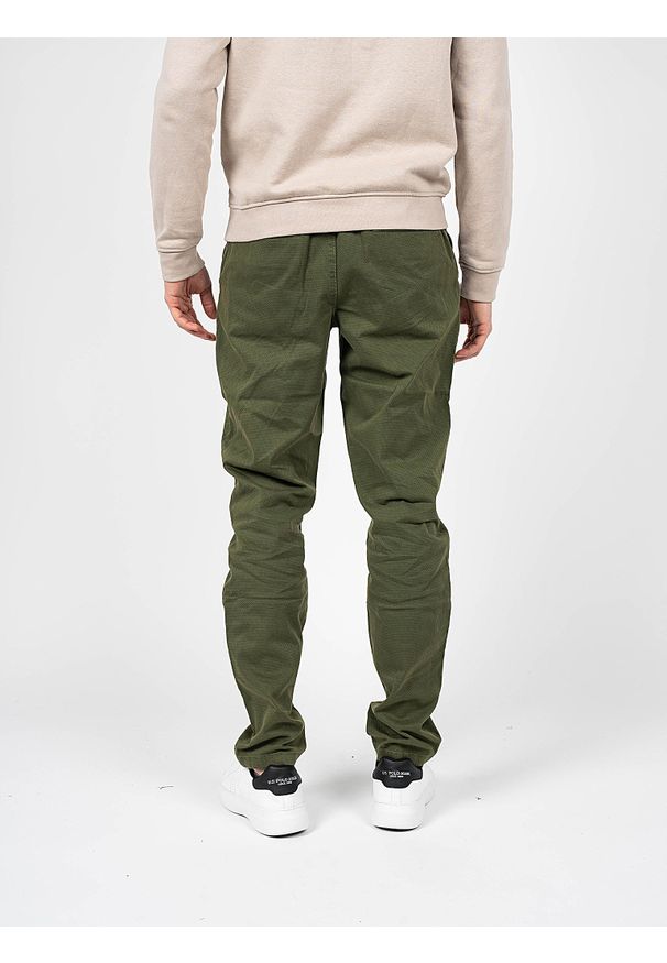 Pepe Jeans Spodnie "Keys Minimal" | PM2115234 | Keys Minimal | Mężczyzna | Zielony. Okazja: na co dzień. Kolor: zielony. Materiał: bawełna, elastan. Wzór: aplikacja. Styl: casual