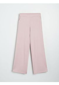 Sinsay - Spodnie dresowe z szerokimi nogawkami soft touch - różowy. Kolor: różowy. Materiał: dresówka