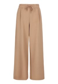 Volcano - Beżowe, luźne spodnie dresowe N-MOCK. Kolor: beżowy. Materiał: dresówka #1