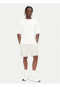 Tommy Jeans Szorty sportowe Entry Graphic DM0DM21369 Beżowy Regular Fit. Kolor: beżowy. Materiał: bawełna. Styl: sportowy #4