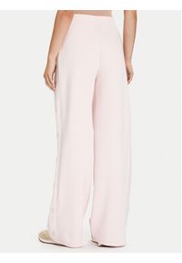 Guess Spodnie dresowe V5BB12 KCX22 Różowy Wide Leg. Kolor: różowy. Materiał: syntetyk #3