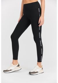 Guess - GUESS Damskie czarne legginsy Aline. Okazja: na co dzień. Kolor: czarny. Materiał: materiał. Długość: długie. Styl: sportowy, casual