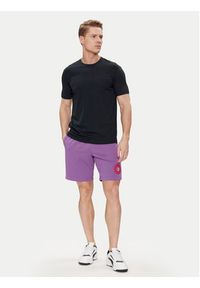 Champion Szorty sportowe 219850 Fioletowy Comfort Fit. Kolor: fioletowy. Materiał: bawełna, syntetyk. Styl: sportowy