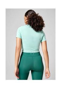 CASALL - Koszulka Casall Delight Short Wrap Tee 36. Kolor: zielony. Sport: joga i pilates