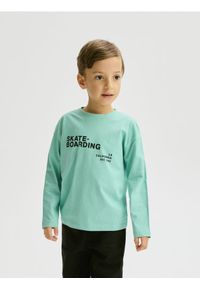 Reserved - Bawełniany longsleeve - jasnoturkusowy. Kolor: turkusowy. Materiał: bawełna. Długość rękawa: długi rękaw