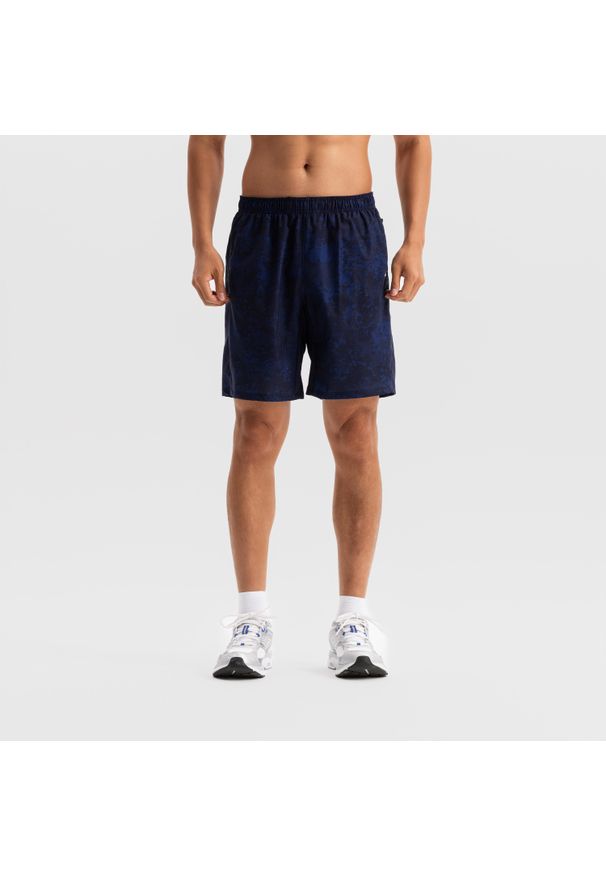 DOMYOS - Spodenki fitness cardio męskie Domyos. Kolor: niebieski. Materiał: poliester, materiał, elastan. Sport: fitness