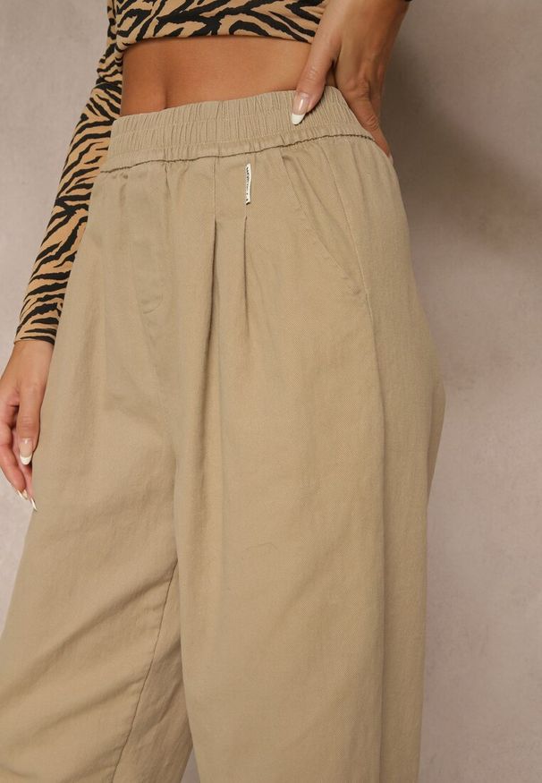 Renee - Beżowe Spodnie High Waist z Bawełny o Szerokim Kroju Nalitia. Okazja: na co dzień. Stan: podwyższony. Kolor: beżowy. Materiał: bawełna. Styl: casual