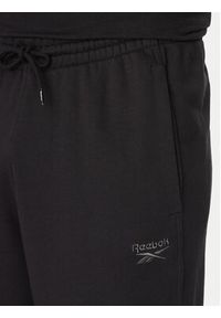 Reebok Spodnie dresowe 100214075 Czarny Regular Fit. Kolor: czarny. Materiał: bawełna #4