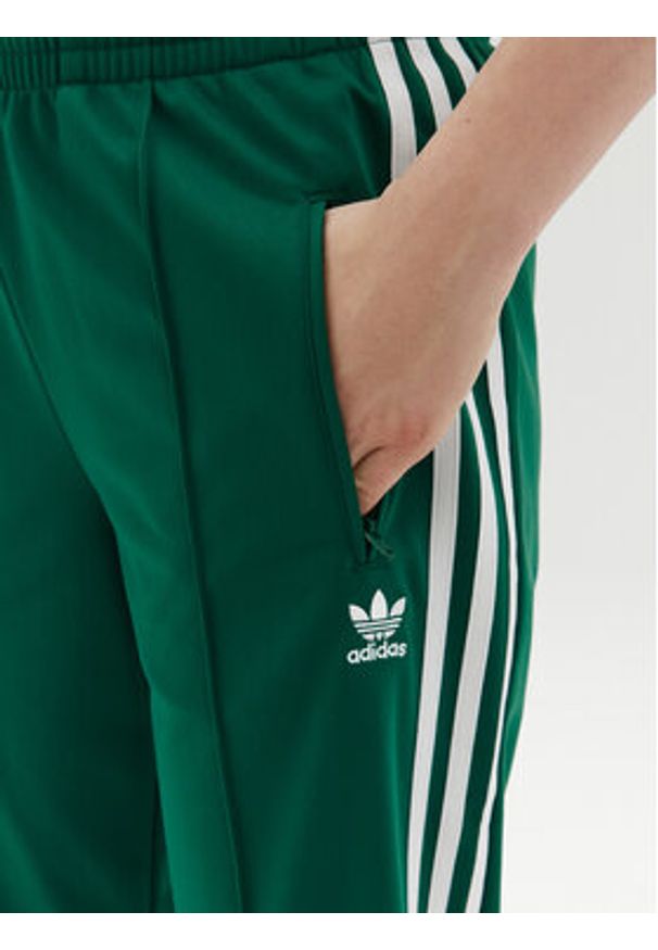 Adidas - adidas Spodnie dresowe adicolor Classics Firebird JC8284 Zielony Regular Fit. Kolor: zielony. Materiał: syntetyk