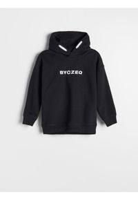 Reserved - Bluza oversize z napisem - czarny. Kolor: czarny. Materiał: bawełna, dzianina. Wzór: napisy