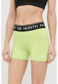 The North Face szorty sportowe damskie kolor zielony z nadrukiem medium waist. Kolor: zielony. Materiał: skóra. Wzór: nadruk. Styl: sportowy