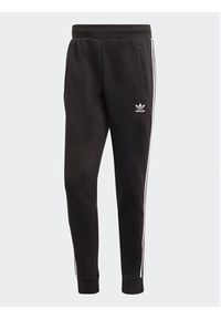 Adidas - adidas Spodnie dresowe adicolor Classics 3-Stripes IA4794 Czarny Fitted Fit. Kolor: czarny. Materiał: bawełna, dresówka, syntetyk