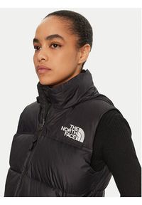 The North Face Bezrękawnik 1996 Retro Nuptse NF0A3XEP Czarny Regular Fit. Kolor: czarny. Materiał: syntetyk. Długość rękawa: bez rękawów. Styl: retro