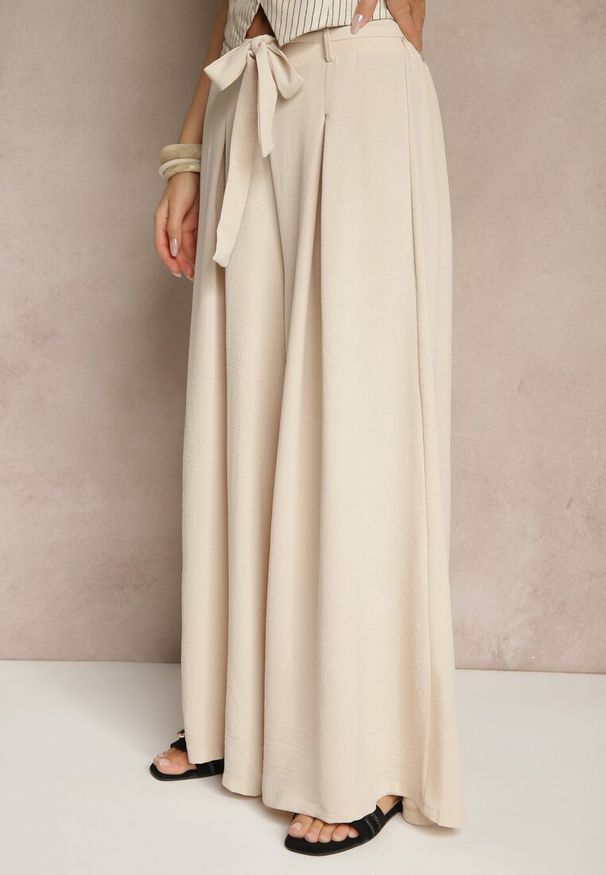 Renee - Beżowe Spodnie z Bawełną o Szerokim Kroju High Waist z Paskiem Iveleldi. Stan: podwyższony. Kolor: beżowy. Materiał: bawełna. Styl: elegancki